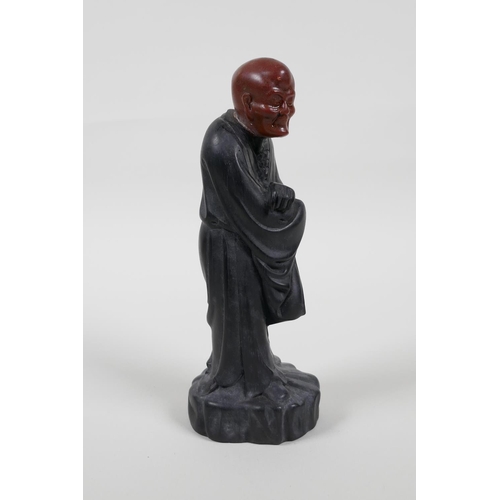 38 - A Chinese carved Zitan wood figure of Lohan with soapstone head, 6