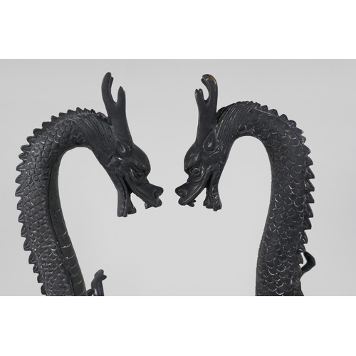 18 - A pair of Chinese bronze figurines of dragons, 16