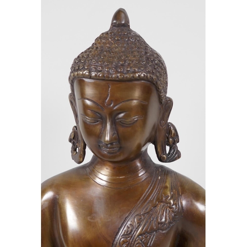 29 - A Chinese bronze figure of Buddha, seated in meditation