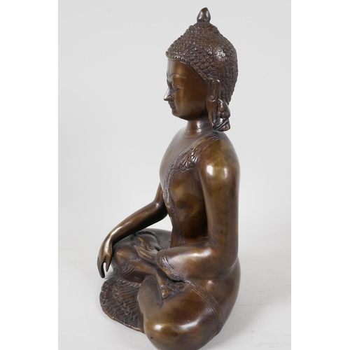 29 - A Chinese bronze figure of Buddha, seated in meditation