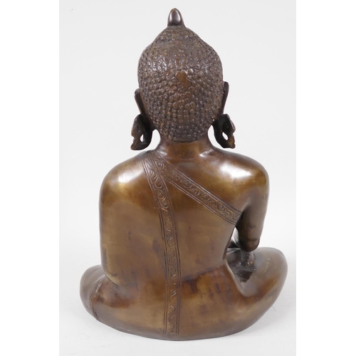 29 - A Chinese bronze figure of Buddha, seated in meditation