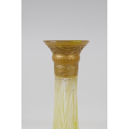 41 - An early C20th Bohemian yellow swirled glass vase, with gilt details, 11