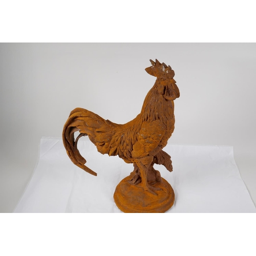 43 - A cast iron garden figure of a cockerel, 17