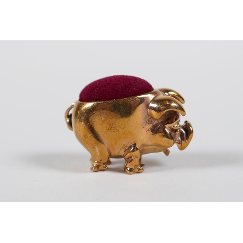 5 - A coppered metal miniature pig pin cushion, 1