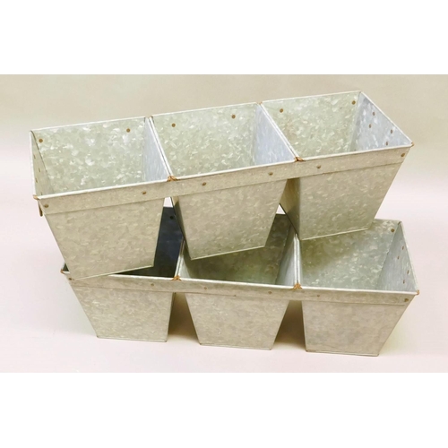 57 - A pair of galvanised metal three section garden planters, 27