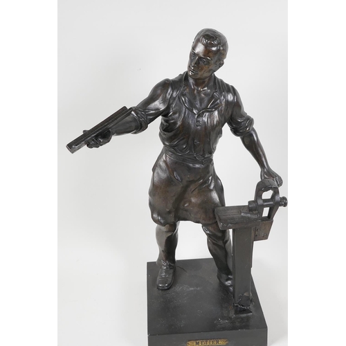 60 - A bronze figure of a metal worker, 16