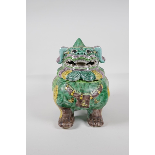 61 - A Chinese Sancai glazed porcelain censer in the form of a fo-dog, 8