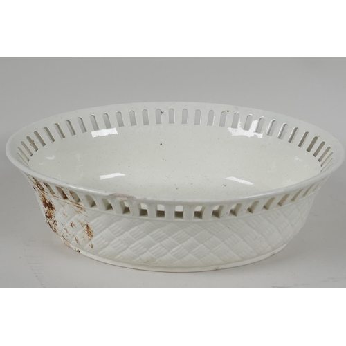 62 - A late C18th Wedgwood creamware basket weave, oval bowl, with pierced rim, (chips to rim) 9