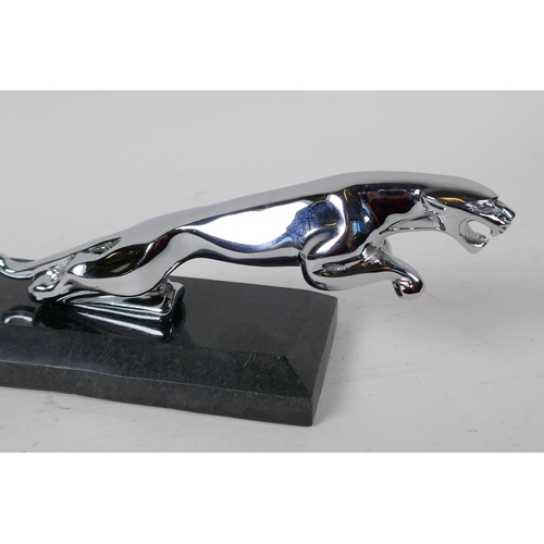 64 - A chrome plated Jaguar car mascot paper weight, on a hard stone base 8