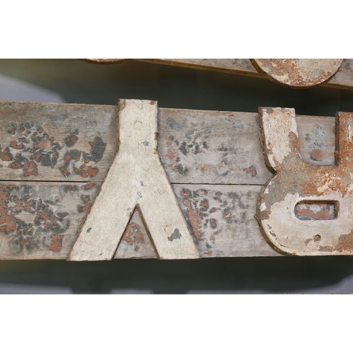 1203 - Architectural salvage, a weathered wood Railway station sign with cast iron letters, Congresbury, 18... 