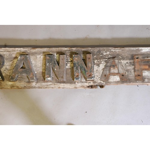 1204 - Architectural salvage, a weathered wood railway station sign, Crannaford, 75