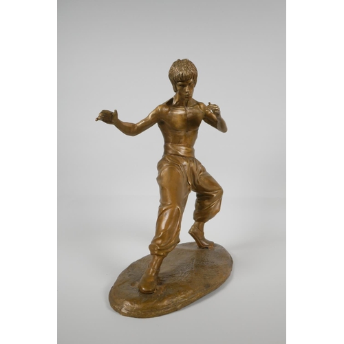 10 - A gilt bronze figure of Bruce Lee, 13