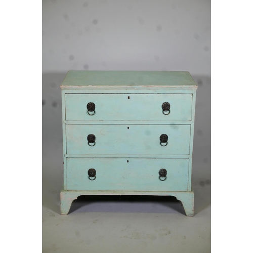 1024 - C19th painted pine chest of three long drawers, with lion mask handles, raised on bracket supports, ... 