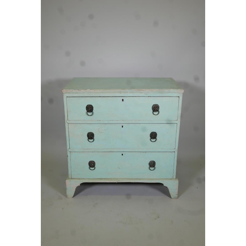 1024 - C19th painted pine chest of three long drawers, with lion mask handles, raised on bracket supports, ... 