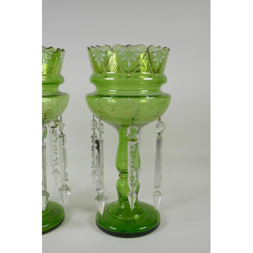 12 - A pair of Bohemian green glass lustres, with gilt & enamel decoration, 1 drop missing, AF, 13½