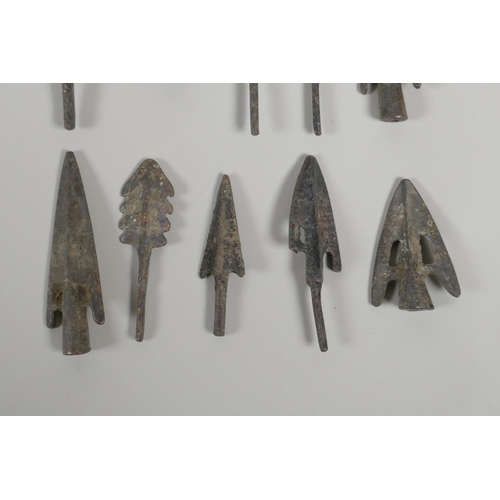 28 - Ten Archaic style bronze arrowheads, largest 3