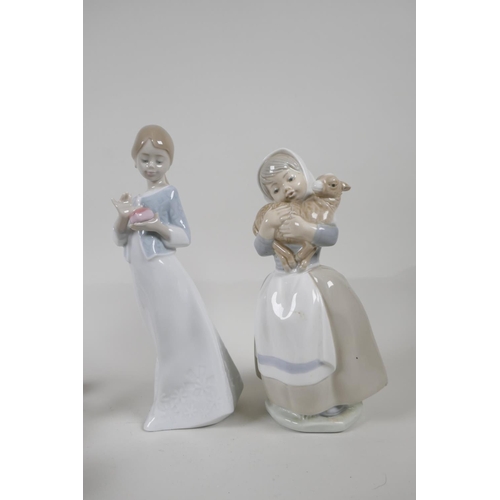 3 - Four Lladro porcelain figures of children and two similar Nao figures, A/F, largest 9