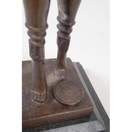 39 - An Art Deco style figurine of a dancing girl, after Preis, on a stepped base, 16½