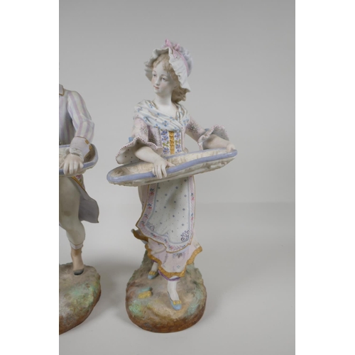 43 - A pair of Royal Dux ceramic figures carrying baskets, mark to base, 14