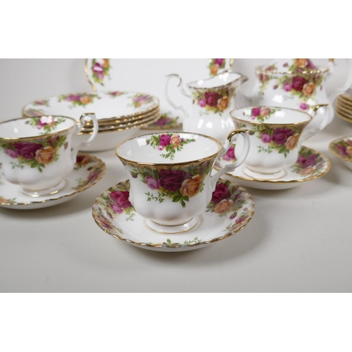 44 - A Royal Albert Old Country Rose part dinner & tea service to include 6 dinner plates, 6 side pla... 