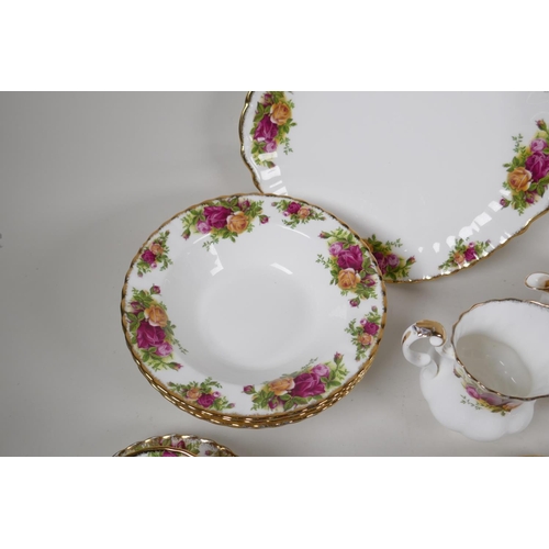 44 - A Royal Albert Old Country Rose part dinner & tea service to include 6 dinner plates, 6 side pla... 