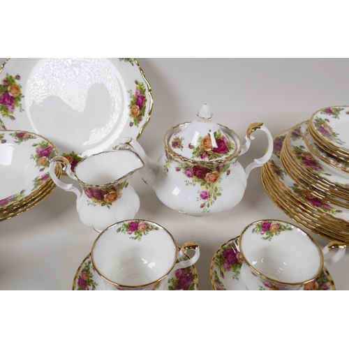 44 - A Royal Albert Old Country Rose part dinner & tea service to include 6 dinner plates, 6 side pla... 