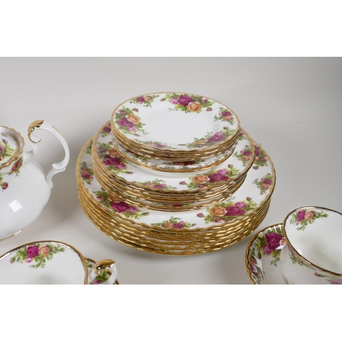 44 - A Royal Albert Old Country Rose part dinner & tea service to include 6 dinner plates, 6 side pla... 