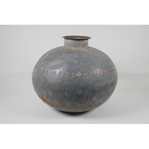 46 - An Indian riveted metal pot/jar, 13½