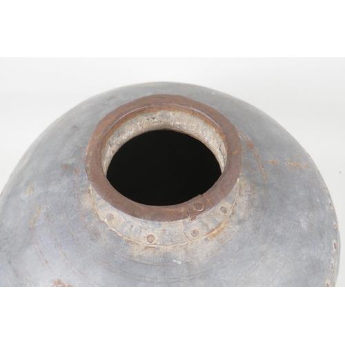 46 - An Indian riveted metal pot/jar, 13½