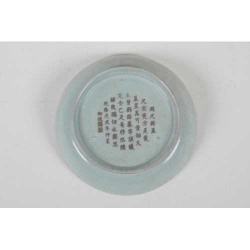 59 - A Chinese celadon Ru ware style porcelain dish, engraved character inscription to base, 5½