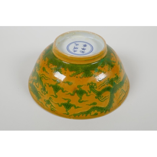 8 - A Chinese yellow & green glazed porcelain bowl, with incised dragon decoration, Ming 6 character... 