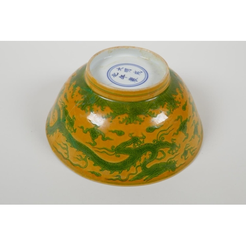 8 - A Chinese yellow & green glazed porcelain bowl, with incised dragon decoration, Ming 6 character... 