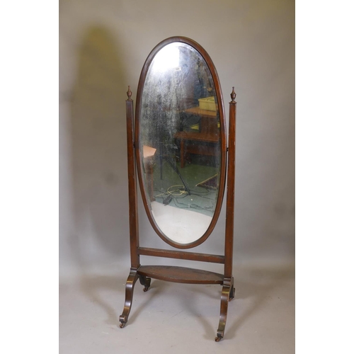 1138 - A Victorian mahogany cheval mirror with original bevelled glass, raised on cabriole supports with br... 