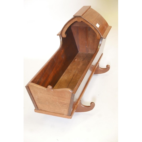 1146 - A Georgian mahogany cradle on rockers, 29