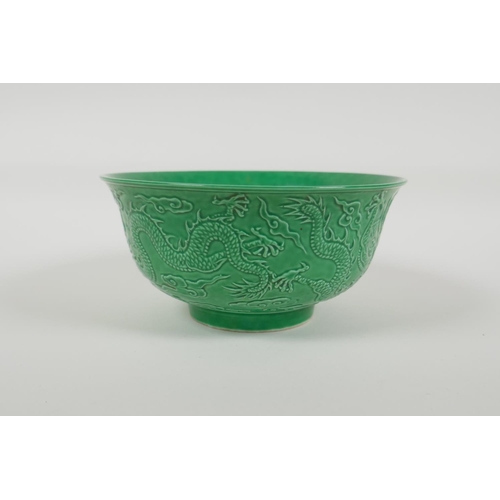 13 - A green glazed porcelain rice bowl with raised dragon decoration, Chinese Yongzheng 6 character mark... 