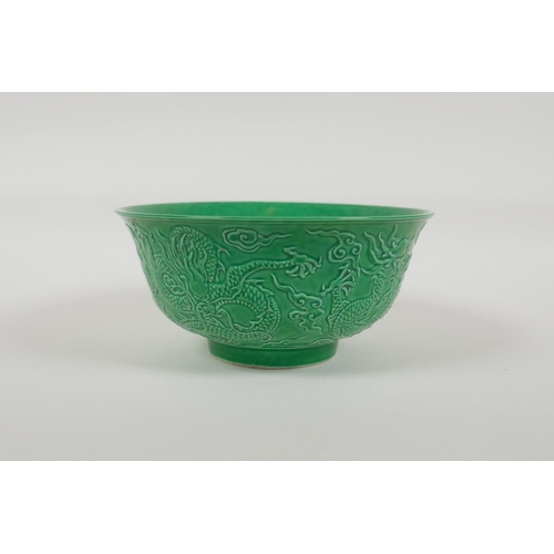 13 - A green glazed porcelain rice bowl with raised dragon decoration, Chinese Yongzheng 6 character mark... 