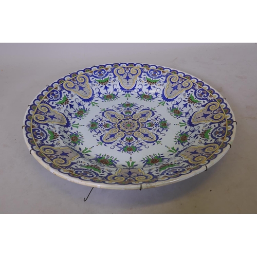 14 - A large continental faience ceramic charger with oriental style decoration, 24