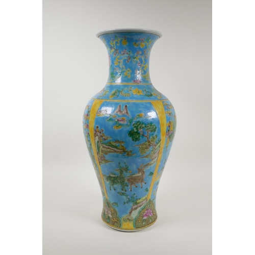 18 - A turquoise and yellow ground porcelain vase with famille vert decoration of Chinese mythical creatu... 