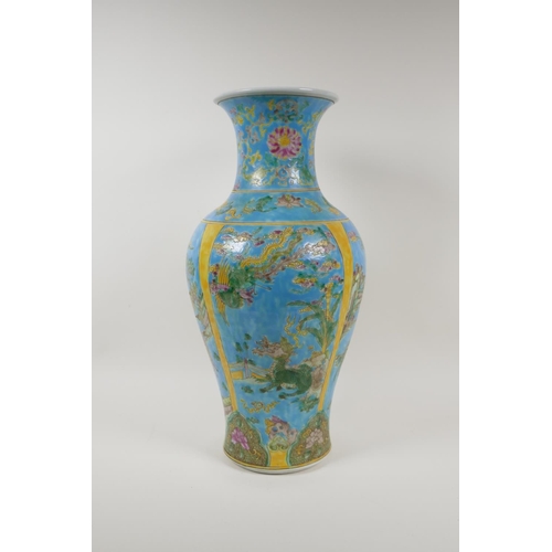 18 - A turquoise and yellow ground porcelain vase with famille vert decoration of Chinese mythical creatu... 