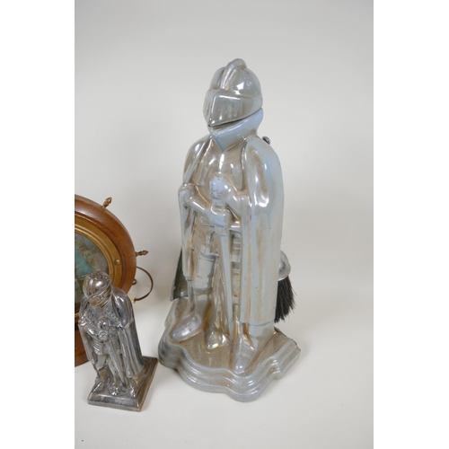 22 - A fireside companion set, the stand cast as a knight in armour, 15