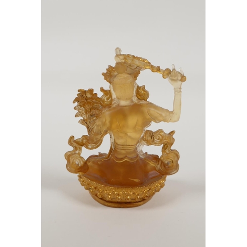 23 - A Sino Tibetan moulded and gilt glass figure of Buddha, 5