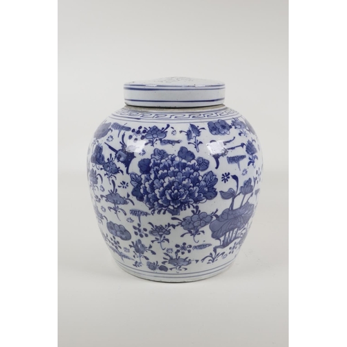 25 - An early C20th Chinese porcelain ginger jar and cover, with floral decoration, 9½