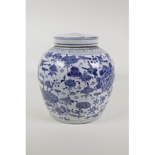 25 - An early C20th Chinese porcelain ginger jar and cover, with floral decoration, 9½