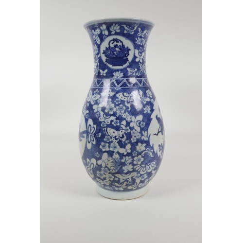 33 - An early C20th Chinese blue and white porcelain vase with two decorative panels depicting birds and ... 