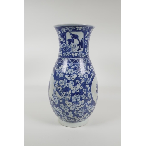 33 - An early C20th Chinese blue and white porcelain vase with two decorative panels depicting birds and ... 