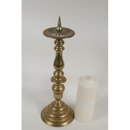 36 - An ecclesiastical turned brass pricket candlestick, 15