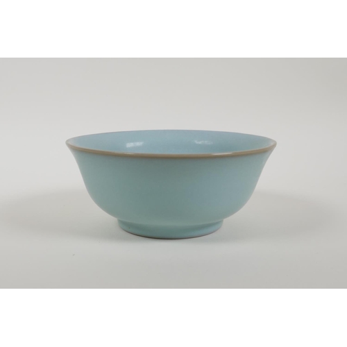 43 - A Chinese celadon Ru ware style porcelain rice bowl, 5½