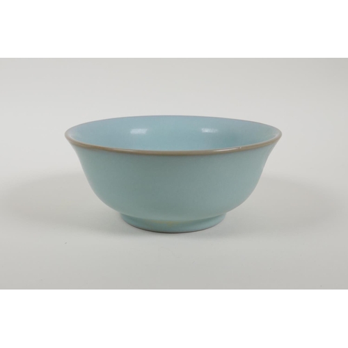 43 - A Chinese celadon Ru ware style porcelain rice bowl, 5½