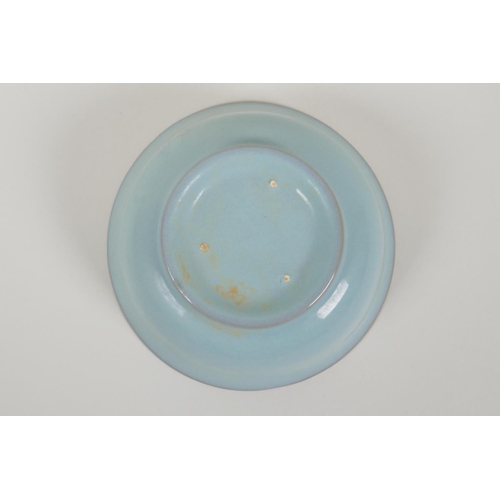 43 - A Chinese celadon Ru ware style porcelain rice bowl, 5½