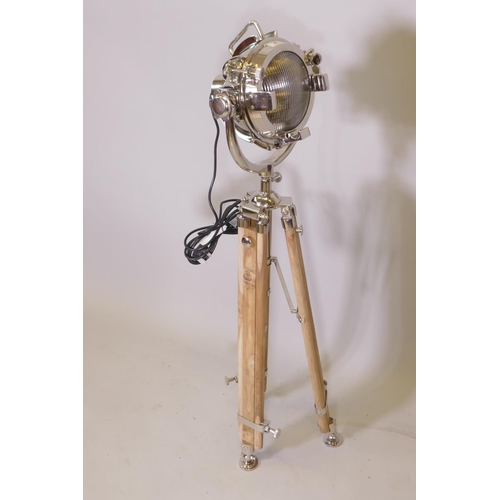 46 - A retro spot light style standard lamp on a wooden tripod base, minimum 45